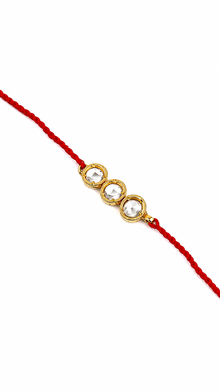 Elegant Gold-Plated Silver Rakhi with Sparkling Stones