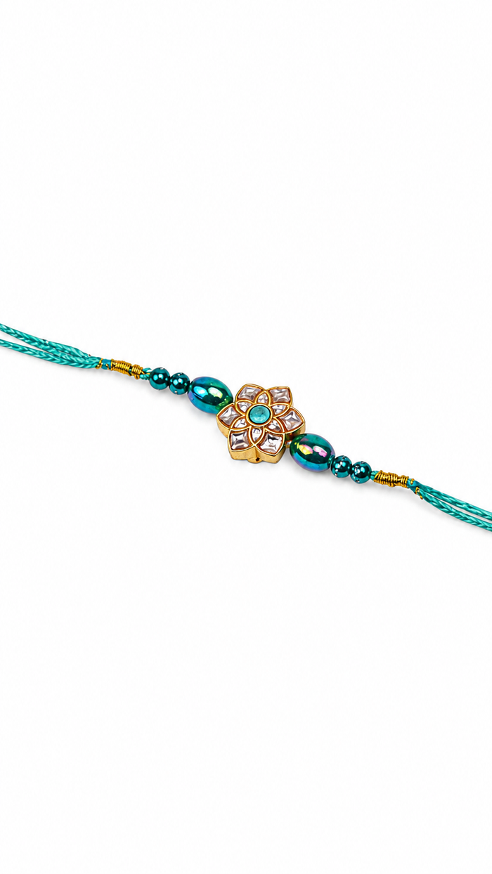 Designer Silver Floral Kundan Rakhi with Teal Beads