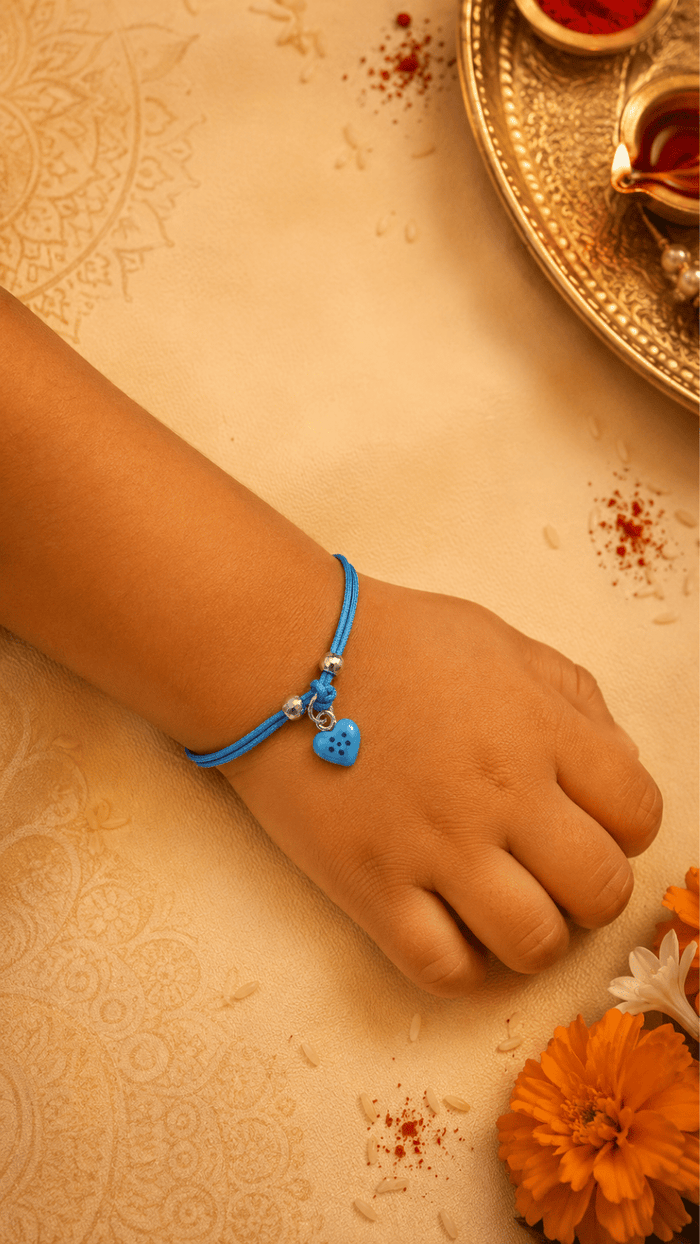 Blue Heart Charm Rakhi Bracelet in 925 Silver