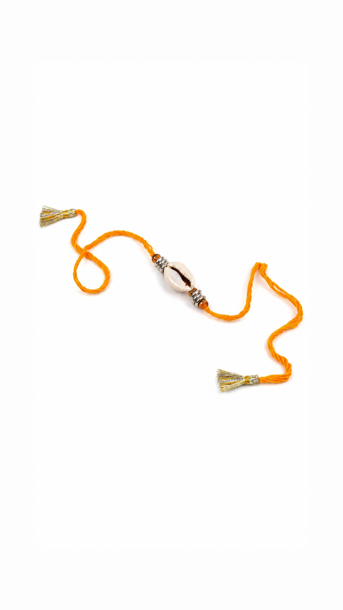 Auspicious Cowrie Shell Pure Silver Rakhi with Orange Thread